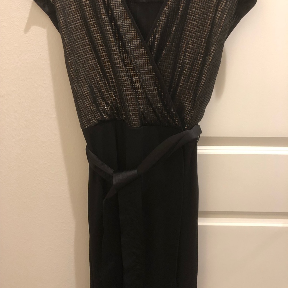 Black and gold sequence dress